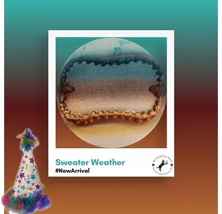 Colorful knitted hat with gradient background.