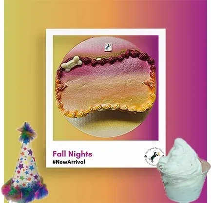 Colorful cake with dog bone decoration.