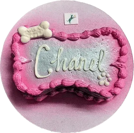 Pink dog cake with "Chanel" decoration.