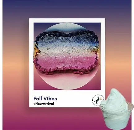 Colorful cake with "Fall Vibes" text overlay.