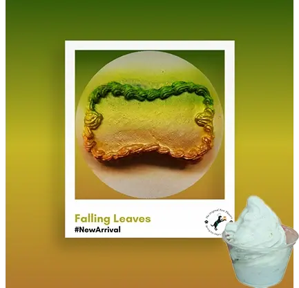 Cake with green and orange icing decoration.