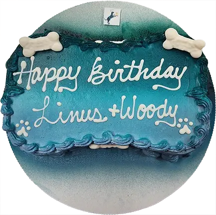 Blue birthday cake with bones and writing.