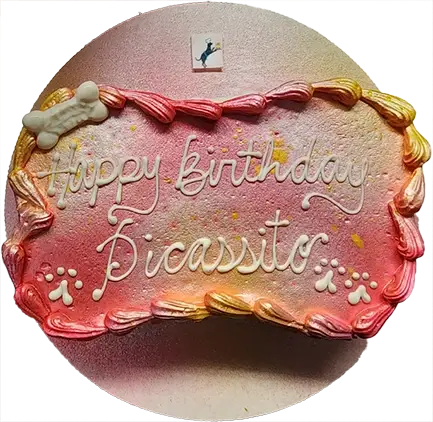 Colorful birthday cake with decorative icing.