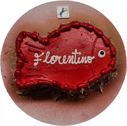 Red fish-shaped cake with "Florentino" text.