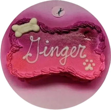 Pink dog treat with bone decoration.