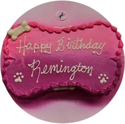 Pink dog bone-shaped birthday cake.