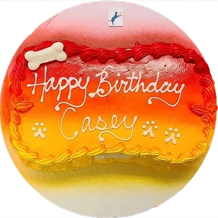 Birthday cake with paw prints and bone.