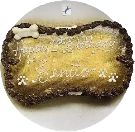 Dog-themed birthday cake with "Happy 1st Birthday.