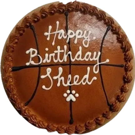 Basketball-themed birthday cake with message.