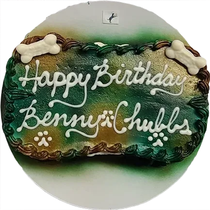 Dog birthday cake with bone decorations.