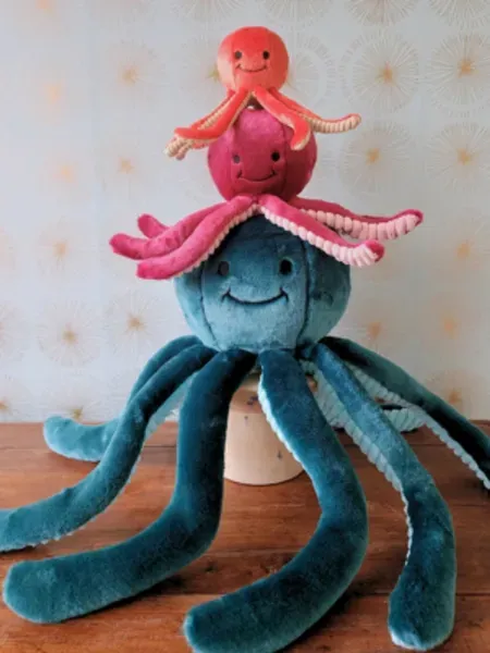 Colorful stuffed octopus toys smiling