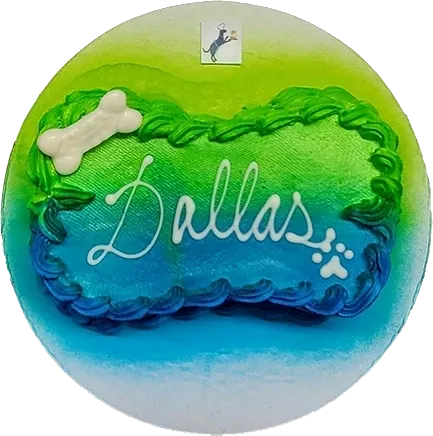 Colorful dog treat with "Dallas" icing.