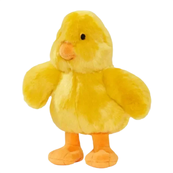 Yellow plush duck toy on black background.