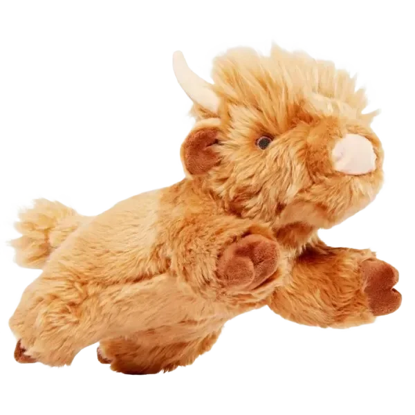 Fluffy brown highland cow plushie on black.