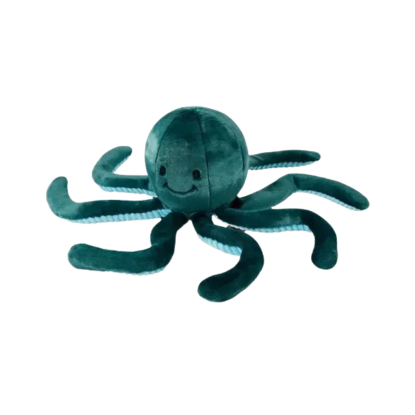 Teal plush octopus on black background.