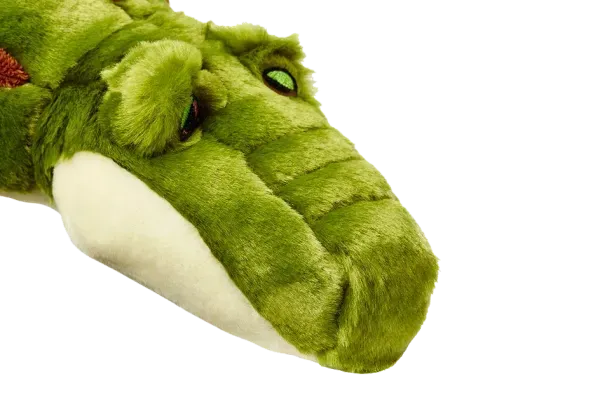 Stuffed crocodile head close-up.