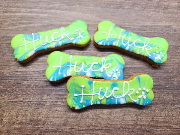 Personalized dog treats on wooden table