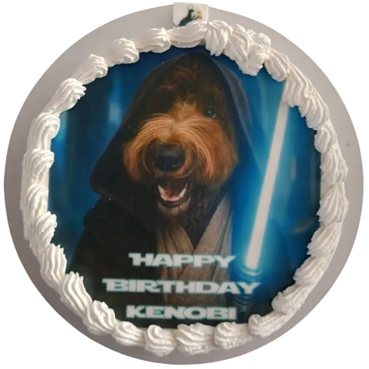 Dog-themed "Happy Birthday Kenobi" cake design.