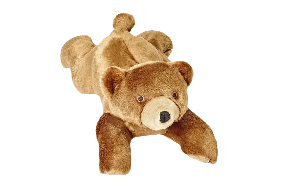 Brown plush bear on black background.