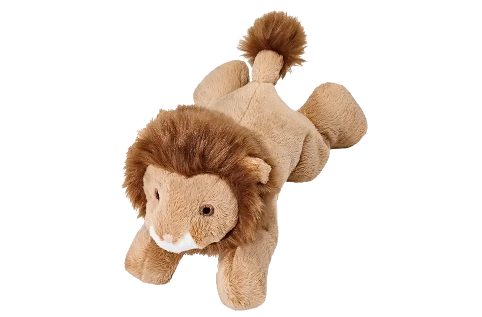 Lion plush toy on black background