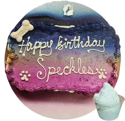 Dog birthday cake with "Happy Birthday Speckles